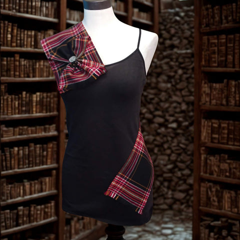 Black dress with plaid accents on a mannequin in a library setting