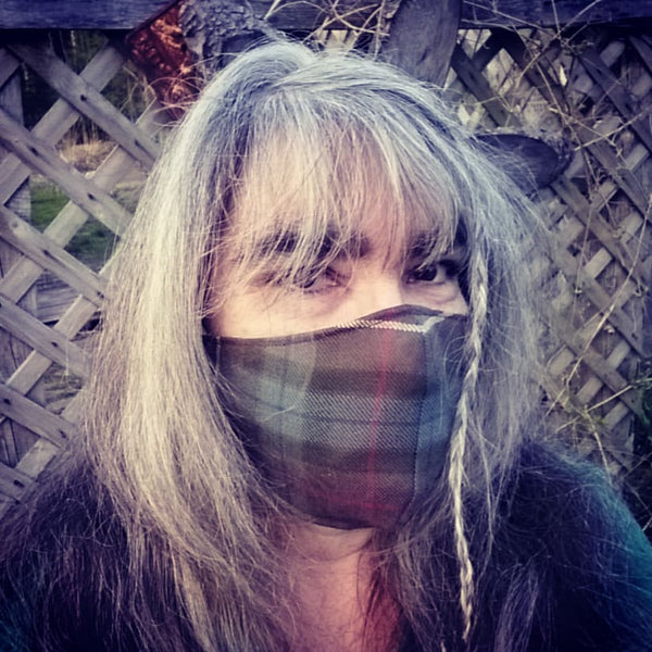 Woman wearing Fraser Hunting Weathered clan tartan mask